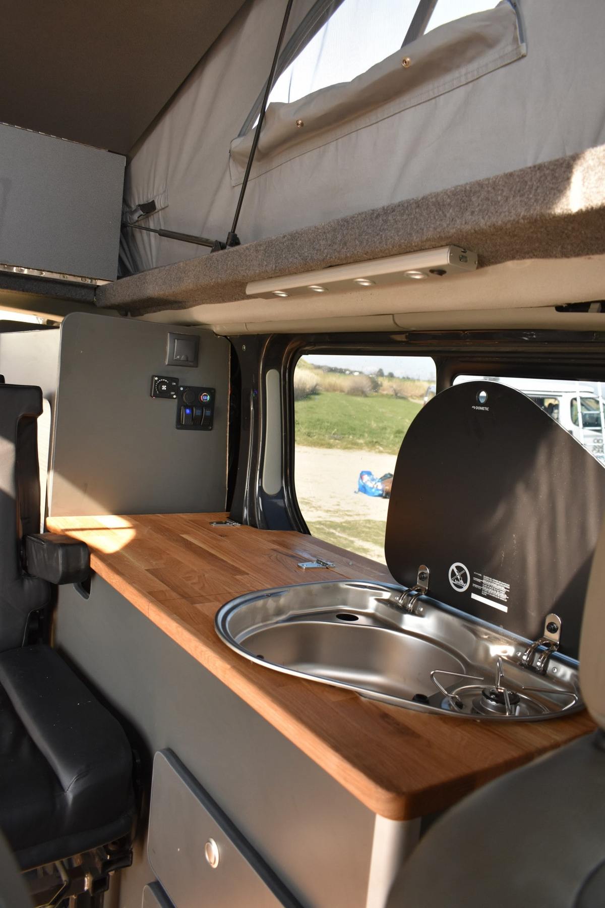 Kitchen area with gas hob in camper