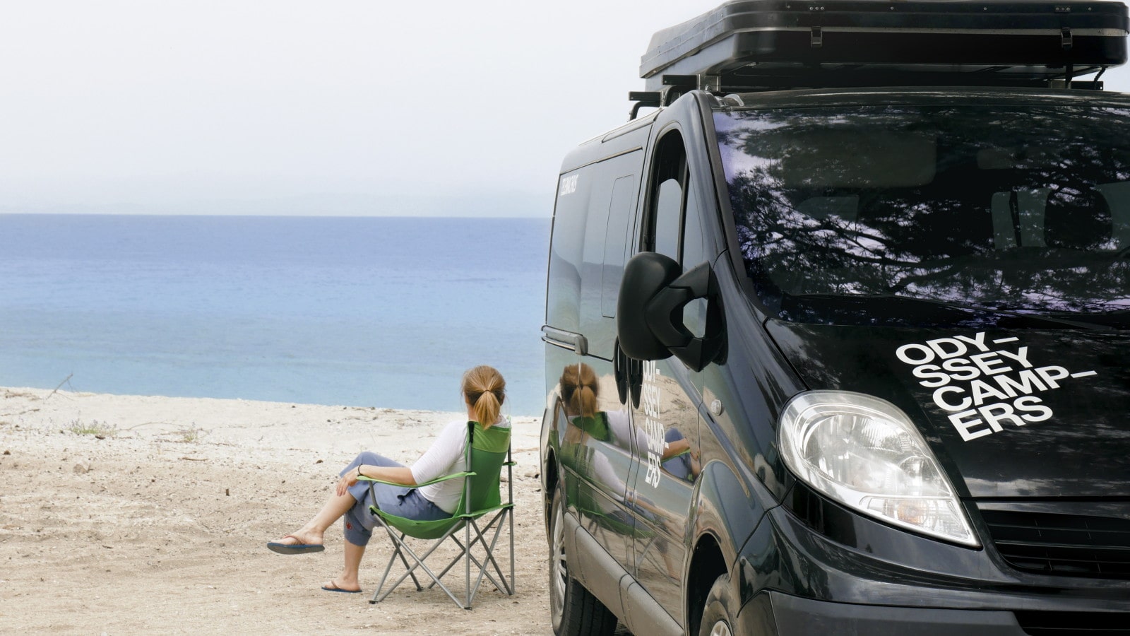 Nissan camper van on the beach Greece
